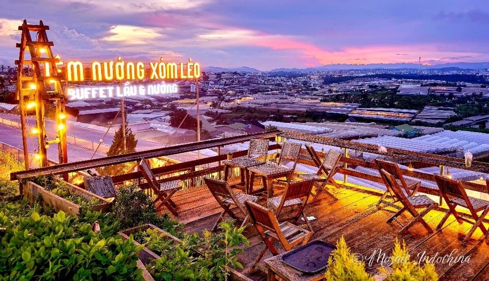 Enjoying breathtaking sunset views from a bar is something not to miss in Dalat.