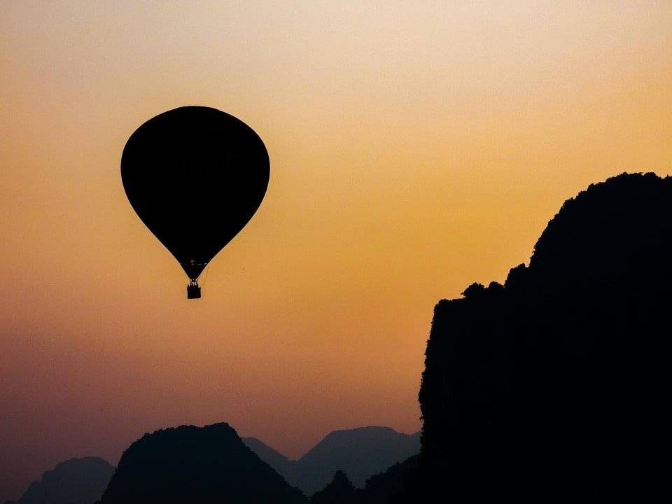 Hot-air balloon tour over karst mountains in Vang Vieng, Laos