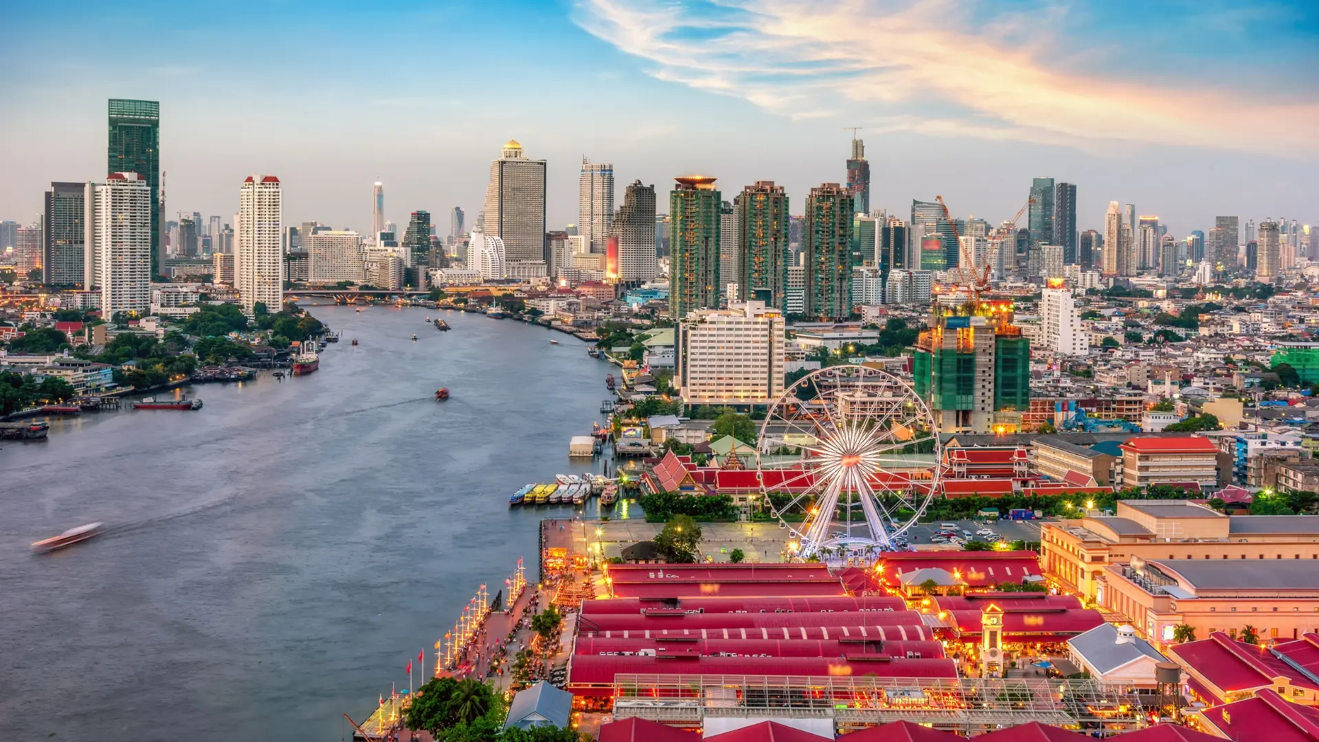 Sprawling Bangkok cityscape with the Chao Phraya River flowing through the urban skyline in Thailand