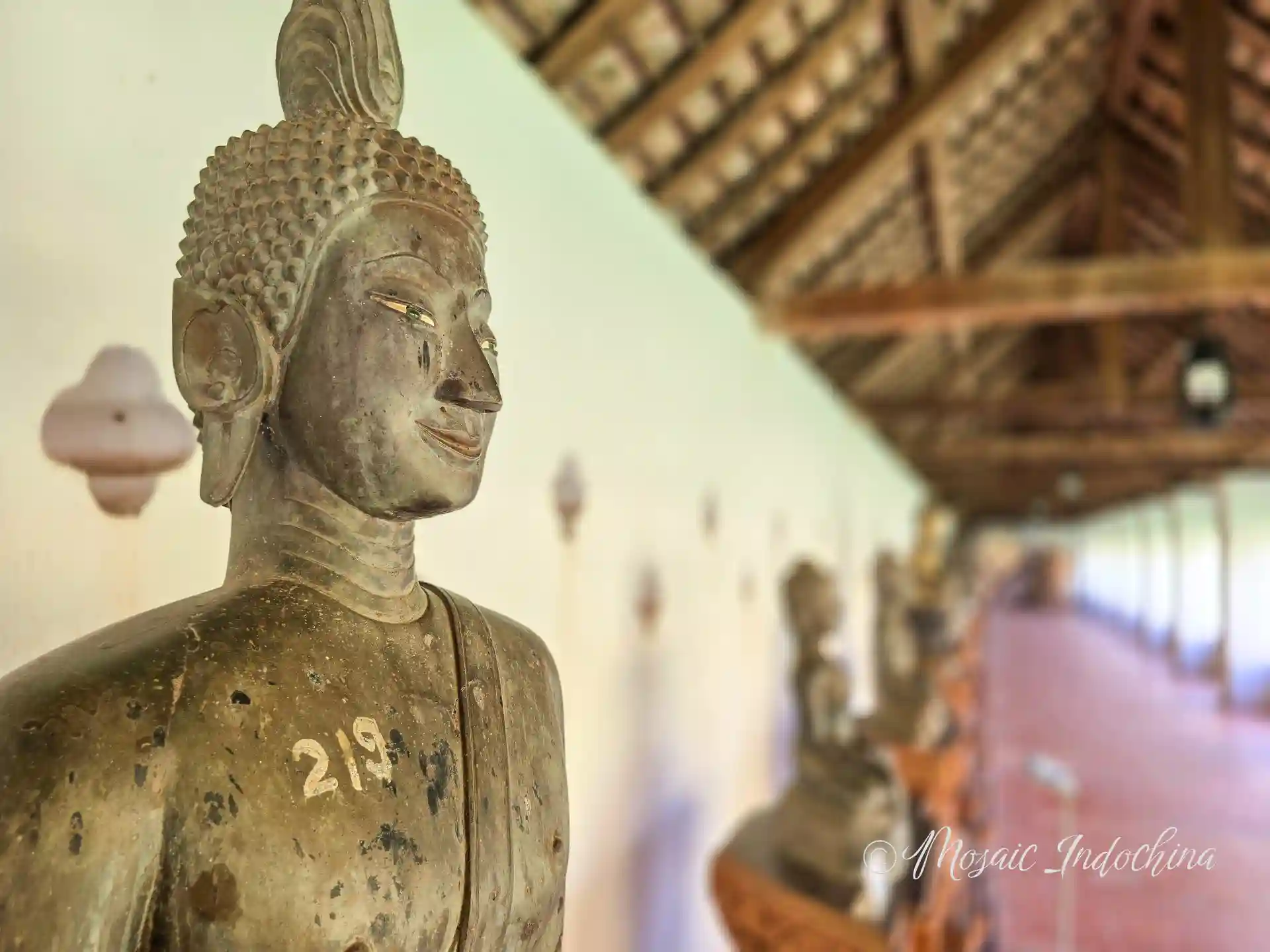Old Buddha Statues in Pha That Luang Temple